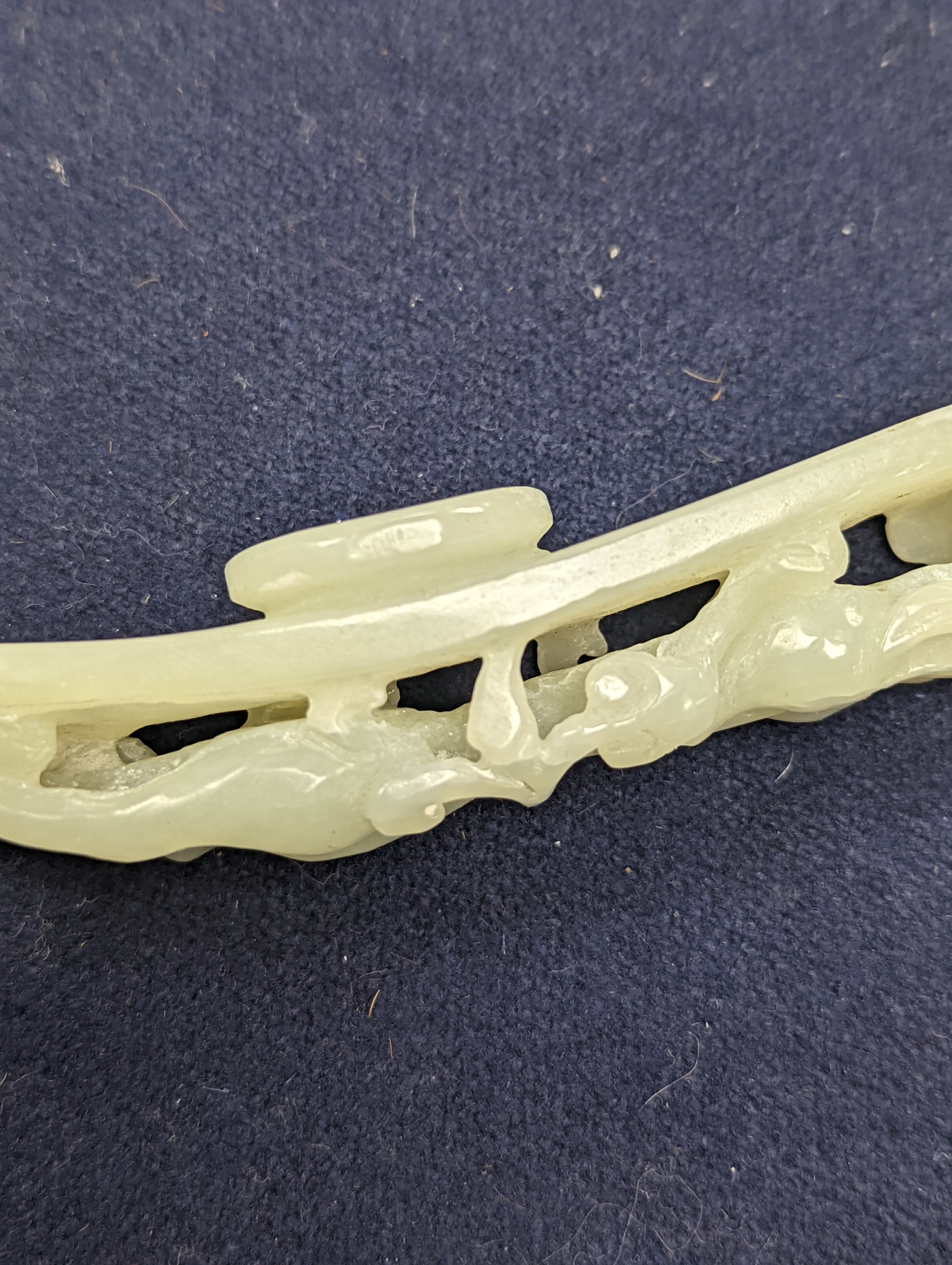 A Chinese jade belt hook, 12.5cm an archer's ring and figure, a stone cup and a glass snuff bottle